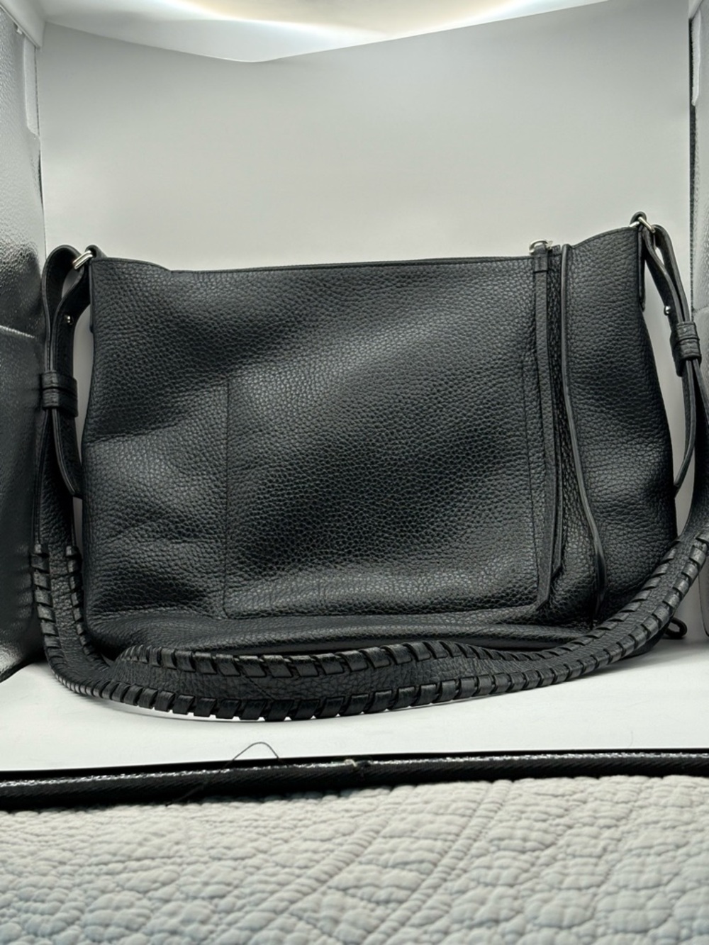 AllSaints Black Pebbled  Leather Crossbody Hobo Bag with Braided Details.